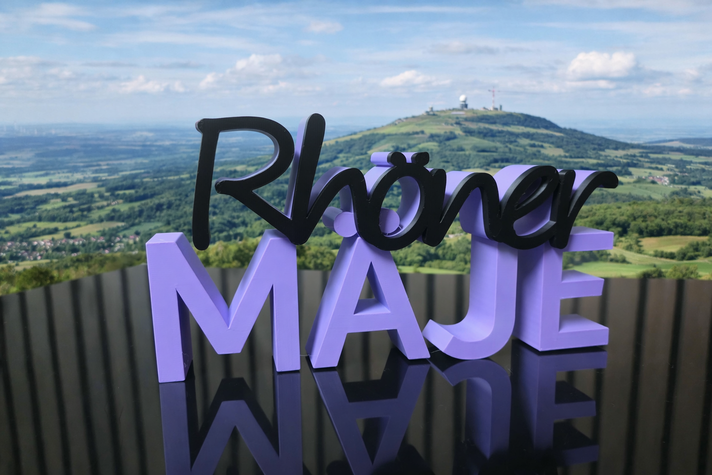 Schriftzug "Rhöner Mäje"